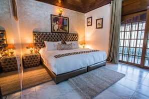 Suite, balcon, vue sur le jardin | Literie de qualitĂ©, minibar, coffre-fort, systĂšme dâinsonorisation