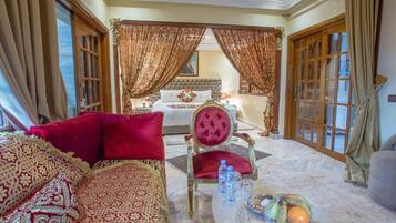 Suite Deluks, pemandangan kebun | Area keluarga