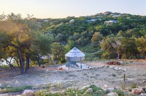 A gazebo on a hill with surrounding trees and a view of houses in the background. - Scenic Canyon Lake Container Retreat (Canyon Lake)