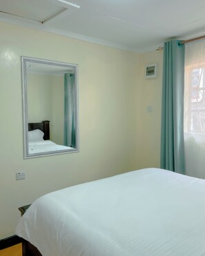 Appartement, balcon, vue sur le jardin | Accès au Wi-Fi (inclus)