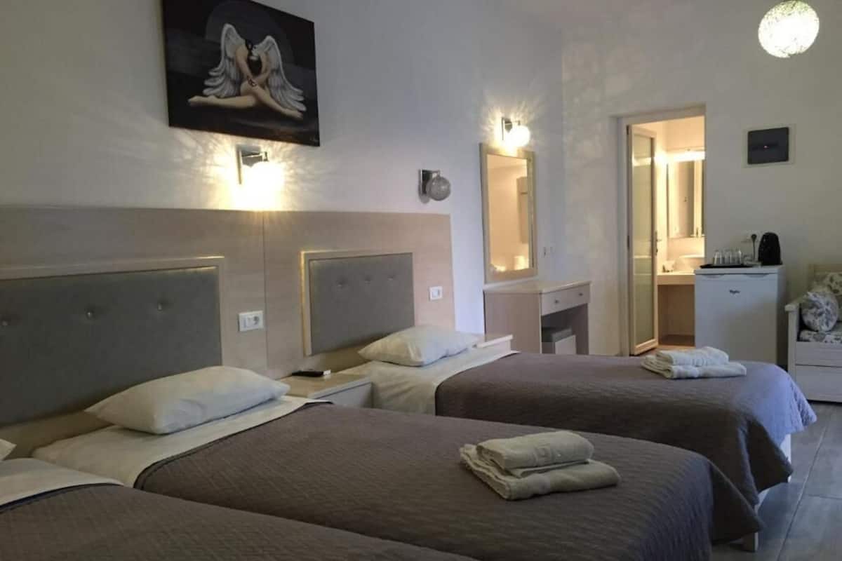 Standard Quadruple Room, Balcony, Garden View