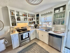 Fridge, microwave, oven, stovetop - 2-bedroom Cottage in Fun-Filled Carolina Beach, 3 blocks to beach & downtown (Carolina Beach)
