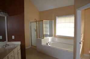 Jetted bath, hair dryer, bidet, towels