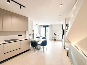 Deluxe appartement, uitzicht op tuin | Interieur