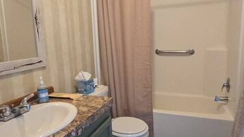 Hair dryer, towels, soap, shampoo