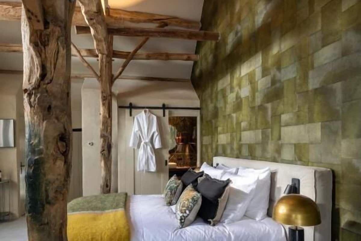 Suíte luxo, vista para o jardim