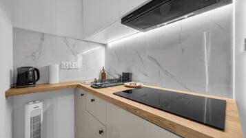Fridge, microwave, stovetop, cookware/dishes/utensils