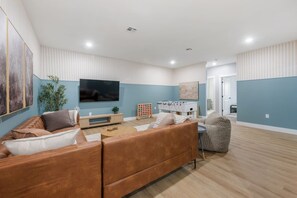 TV, fireplace, books - Family Home | Sleeps 8 | Walk to K-State (Manhattan)