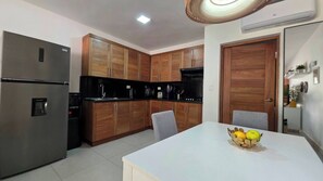 Private kitchen - Family-friendly and beachfront Condo offering a breathtaking view of the ocean. (Cabarete)