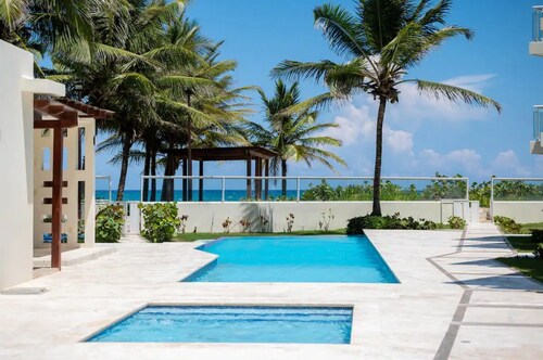 Family-friendly and beachfront Condo offering a breathtaking view of the ocean.