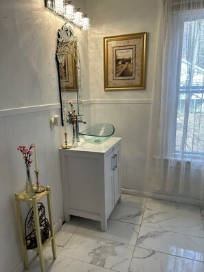 Hair dryer, towels, soap, toilet paper