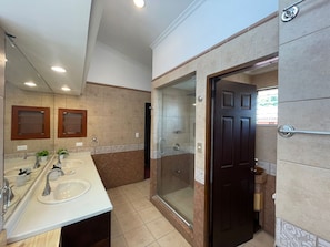 Shower, towels, soap, toilet paper