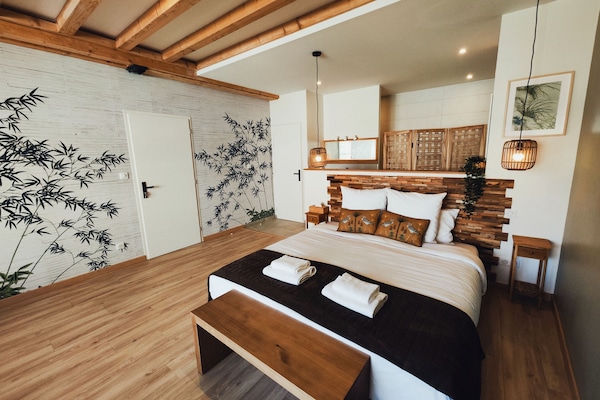 Suite Premium, vue jardin (BOIS)