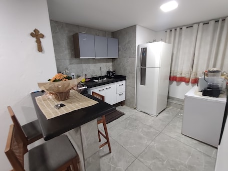 Private kitchen. Cozy Apartment with Minas Gerais Charm