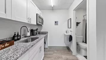 Hair dryer, towels, soap, toilet paper