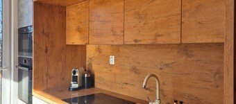 Garden Residence - Tranquil 2-Bedroom Apartment with private Garden & AC