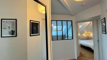 2 habitaciones, tabla de planchar con plancha, wifi y ropa de cama