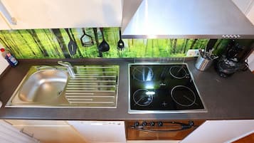 Condo clásico, vista al jardín | Cocina privada