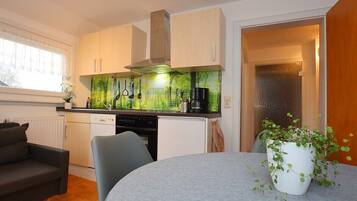 Condo clásico, vista al jardín | Cocina privada