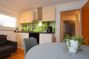 Apartamento clásico, vistas al jardín | Cocina privada