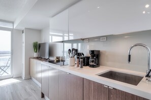 Departamento de lujo, vista a la ciudad | Cocina privada