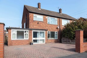 Exterior - Perfect Booking | 4 Bed Home – Near City & Airport (Heald Green)