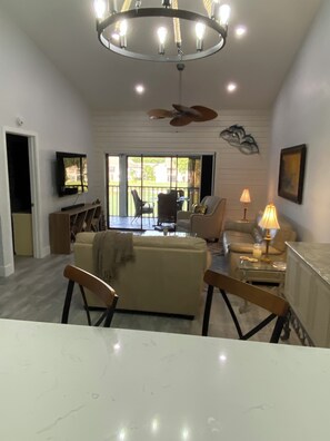 Living area - Golf and lake view. Social community with restaurant, tennis, & golf. Furnished. (Fort Myers)