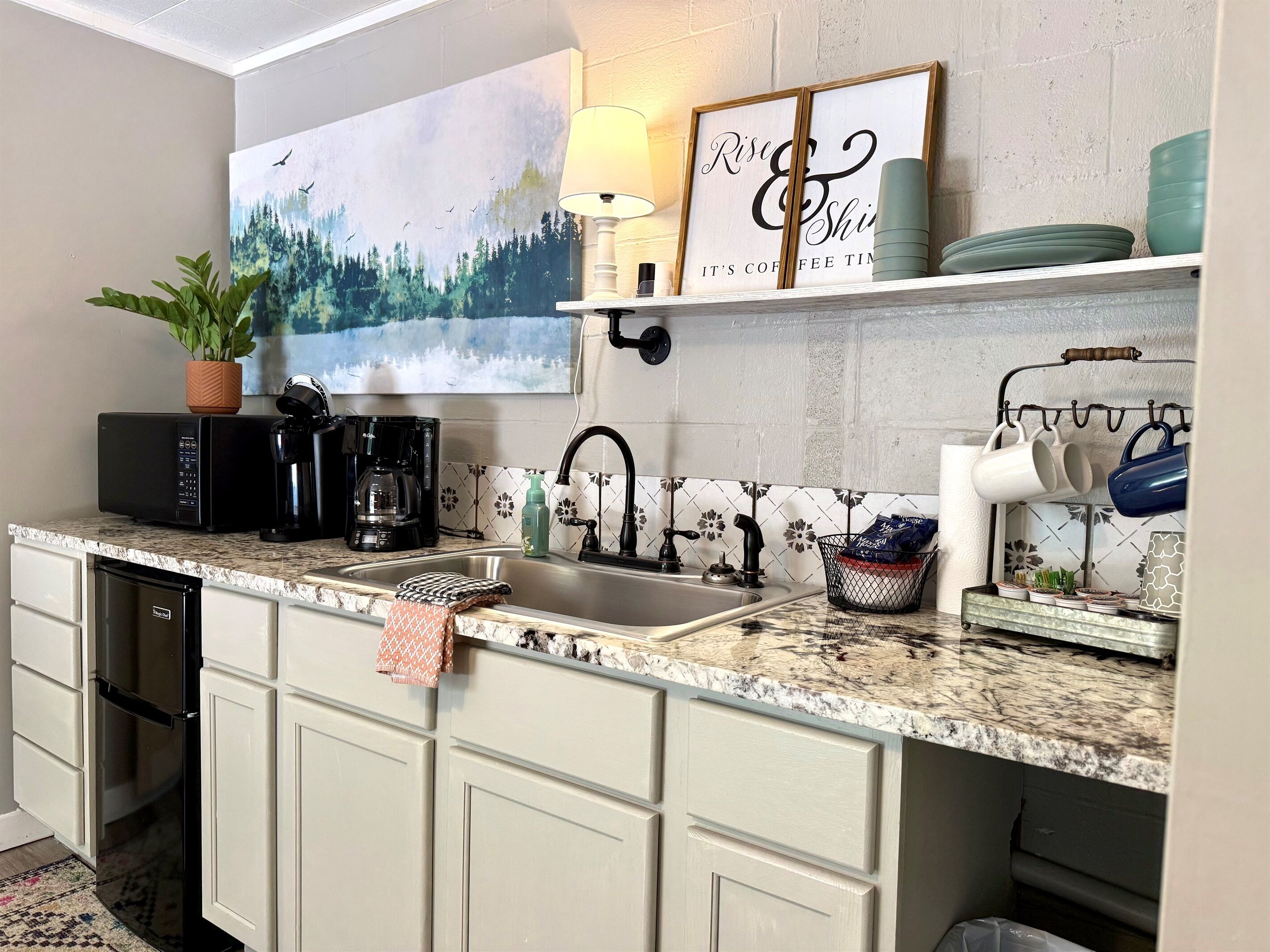 Coffee/tea maker, fridge, microwave, cookware/dishes/utensils