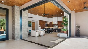 A modern interior with a kitchen, dining area, and living space. - Luxury NEW home Built 2024-Pool-Sedona Red Rock Views (Sedona)
