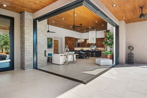 A modern interior with a kitchen, dining area, and living space. - Luxury NEW home Built 2024-Pool-Sedona Red Rock Views (Sedona)