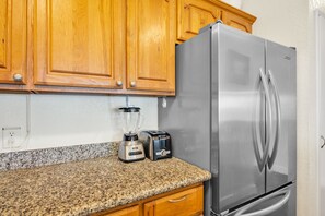 Modern stainless-steel refrigerator and countertop appliances for all your vacation cooking needs NAP-C37 - Napili Point | Oceanfront 6 BR, Sleeps 18 | Car Incl. w/ 6+ Nights | NAP ML-3912 by KBM (Lahaina)