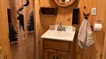 Shower, towels, soap, toilet paper