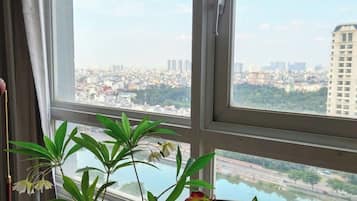 Apartamento luxo, 3 quartos, suíte, vista para a cidade | Comodidades do quarto