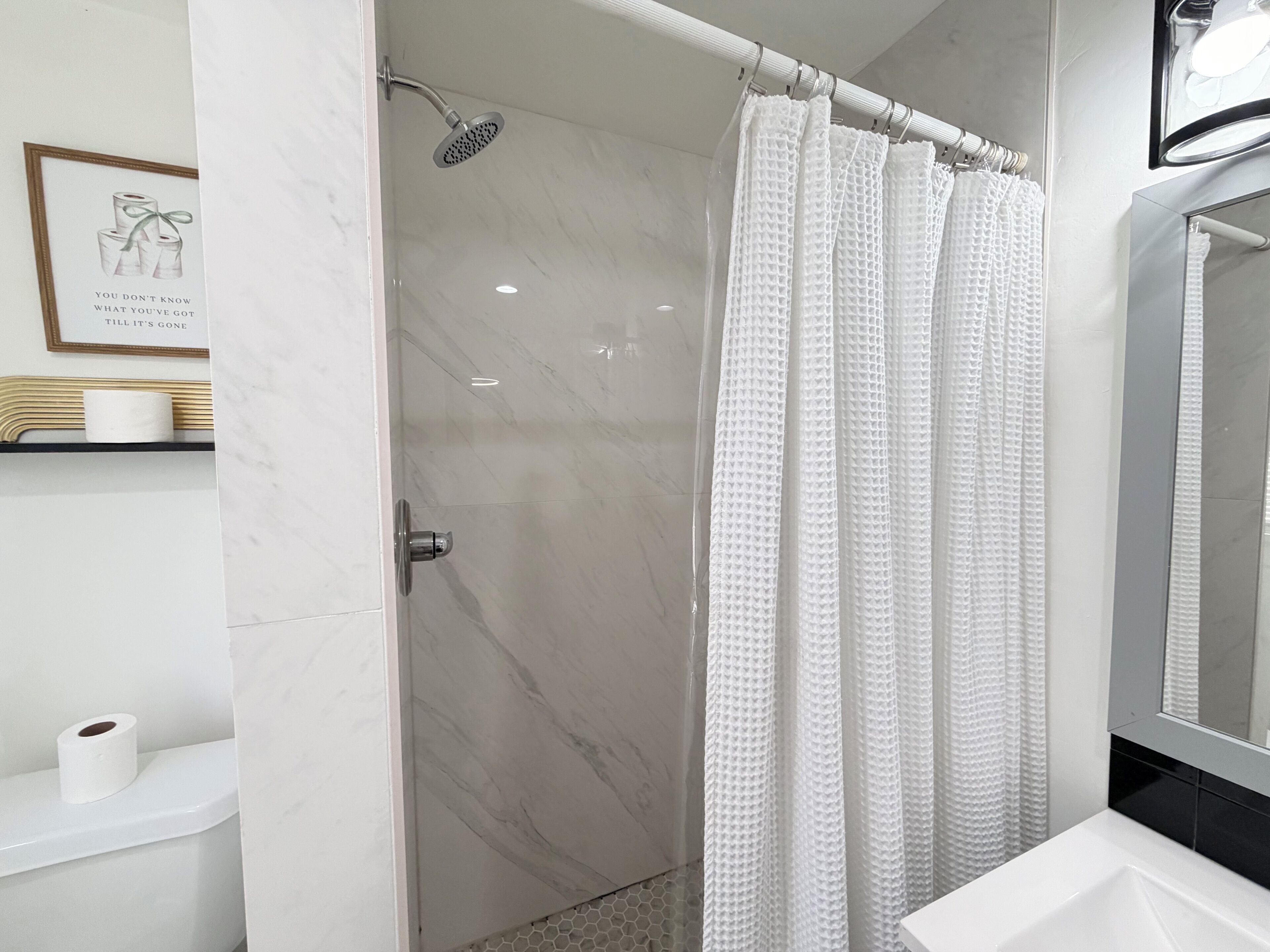 Hair dryer, towels, soap, toilet paper