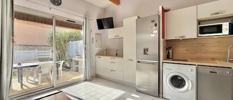 Fridge, microwave, cookware/dishes/utensils