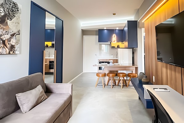 Apartment | Living area | 55-inch Smart TV with cable channels, Netflix, streaming services