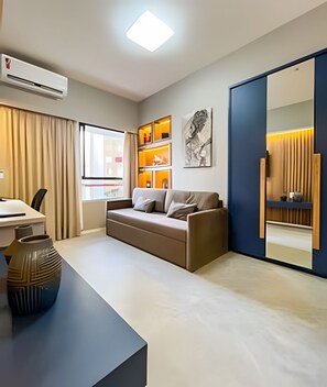 Appartement | Coin séjour | TV connectée de 55 pouces avec chaînes par câble, Netflix