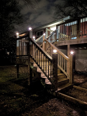 A wooden staircase leading to a deck with railings and lights. - Peaceful Hot Tub Hideaway - 15 mins to Chatt - Dog Friendly (Rossville)