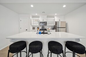 Fridge, microwave, oven, stovetop - Modern 4BR Tulsa Retreat for Groups • Fire Pit + Game Room • Walk to TU/Midtown (Tulsa)