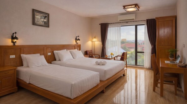 Deluxe Triple Room, Multiple Beds, Air conditioning, Garden View