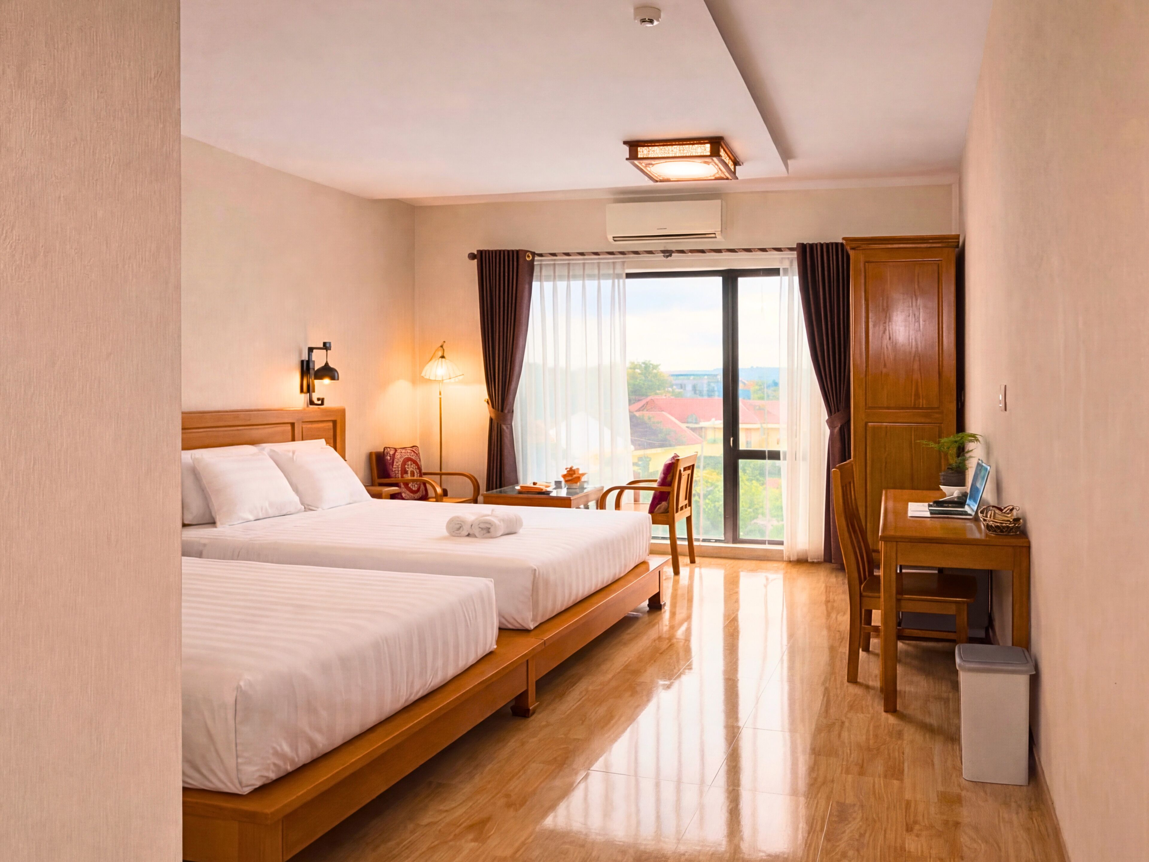 Deluxe Triple Room, Multiple Beds, Private Bathroom, Garden View | Minibar, desk, laptop workspace, rollaway beds