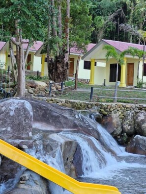 Deluxe Quadruple Room, Patio, Partial Sea View | Property grounds