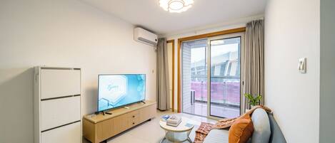 Familien-Suite, 1 Queen-Bett, Nichtraucher, Stadtblick | Wohnbereich