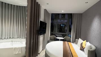 Luxury Double Room, 1 Queen Bed, Non Smoking, City View | Desk, laptop workspace, blackout drapes, soundproofing