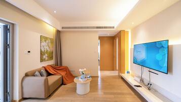 Superior suite, meerdere bedden, niet-roken, uitzicht op stad | Woonruimte