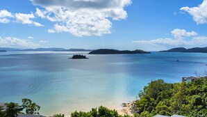 A coastal landscape with clear skies, calm waters, and a small island. - Panorama 3 & Free Buggy - Hamilton Island (Hamilton island)