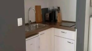 A compact kitchen with a sink, countertop, and cabinets. - Villa Ivan Vodice (Vodice)