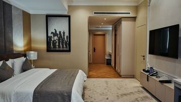 Luxury Suite, City View | In-room safe, desk, soundproofing, iron/ironing board