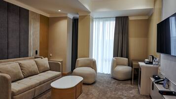 Luxury Suite, City View | In-room safe, desk, soundproofing, iron/ironing board