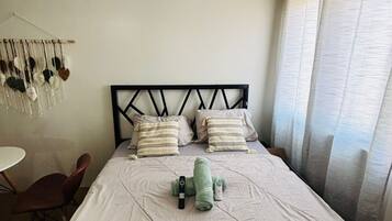 Signature Studio, Pool Access, City View | Living area | 50-inch Smart TV with digital channels